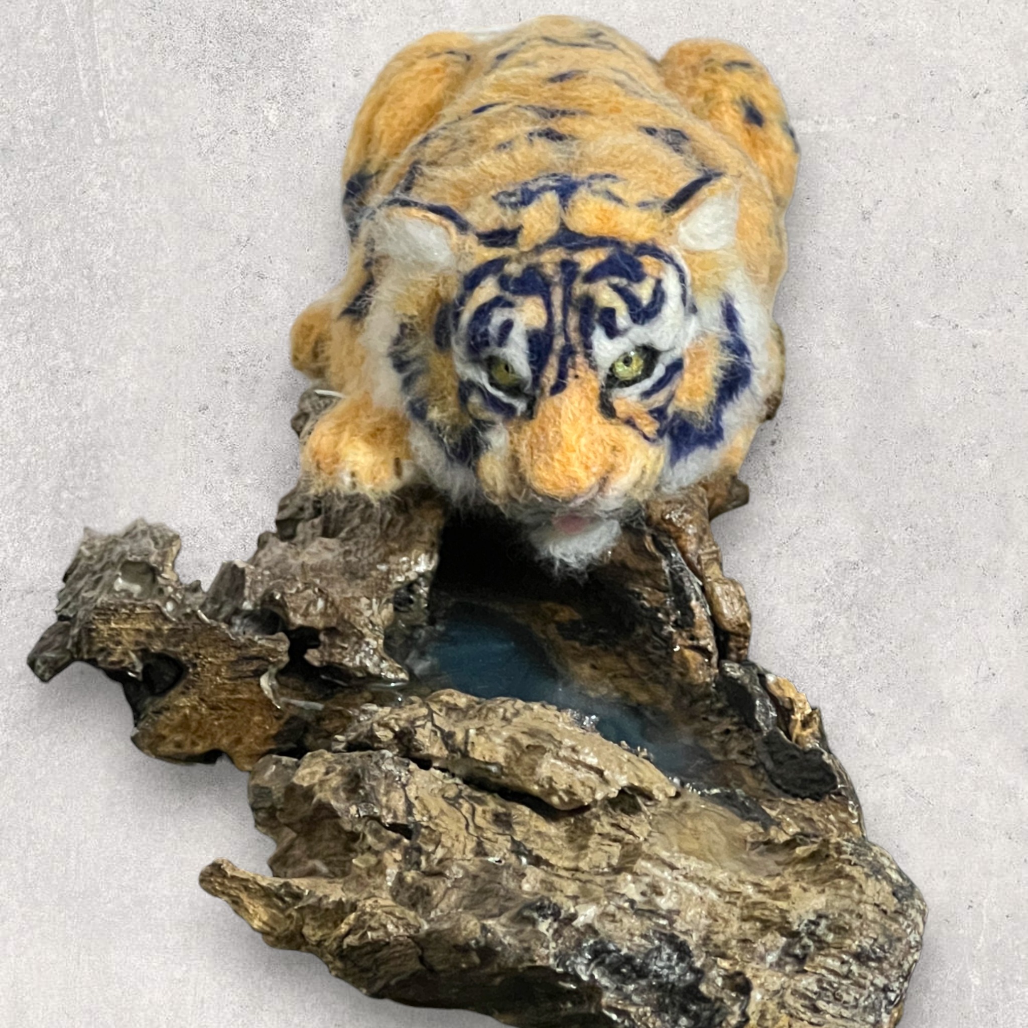 Siberean Tiger at a water hole sculpture